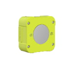 A square, yellow device with a circular reflective surface in the center and four screws at the corners, photographed against a white background.